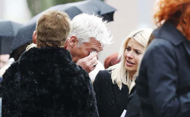 This Morning presenter Phillip Schofield wipes his eye as Holly Willoughby looks on following the funeral of TV agony aunt Denise Robertson Sunderland Minster./Picture by: Owen Humphreys / PA Wire/Press Association Images.