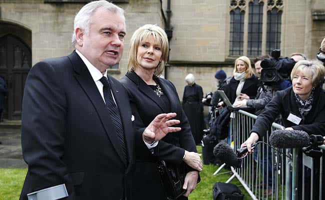 This Morning presenters Eamonn Holmes and wife Ruth Langsford speak to the media outside Sunderland Minster as they arrive for the funeral of TV agony aunt Denise Robertson./Picture by: Owen Humphreys / PA Wire/Press Association Images.