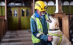 Sam and his handler Peter Monaghan at the Holy Trinity Church, Sunderland. Pictured 11/05/16. By Sophie Dishman.