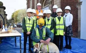 From top to bottom - Councillor John Kelly, Peter Monaghan and Sam the "rot hound" with a group of pupils from Hudson Road Primary school at the Holy Trinity Church in Hendon, Sunderland/By Sophie Dishman.