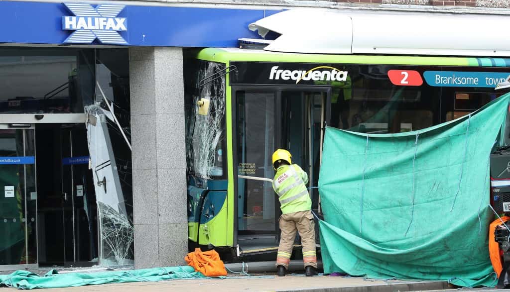 The scene in Darlington where an elderly female pedestrian has died after a bus crashed into a Halifax Bank branch.