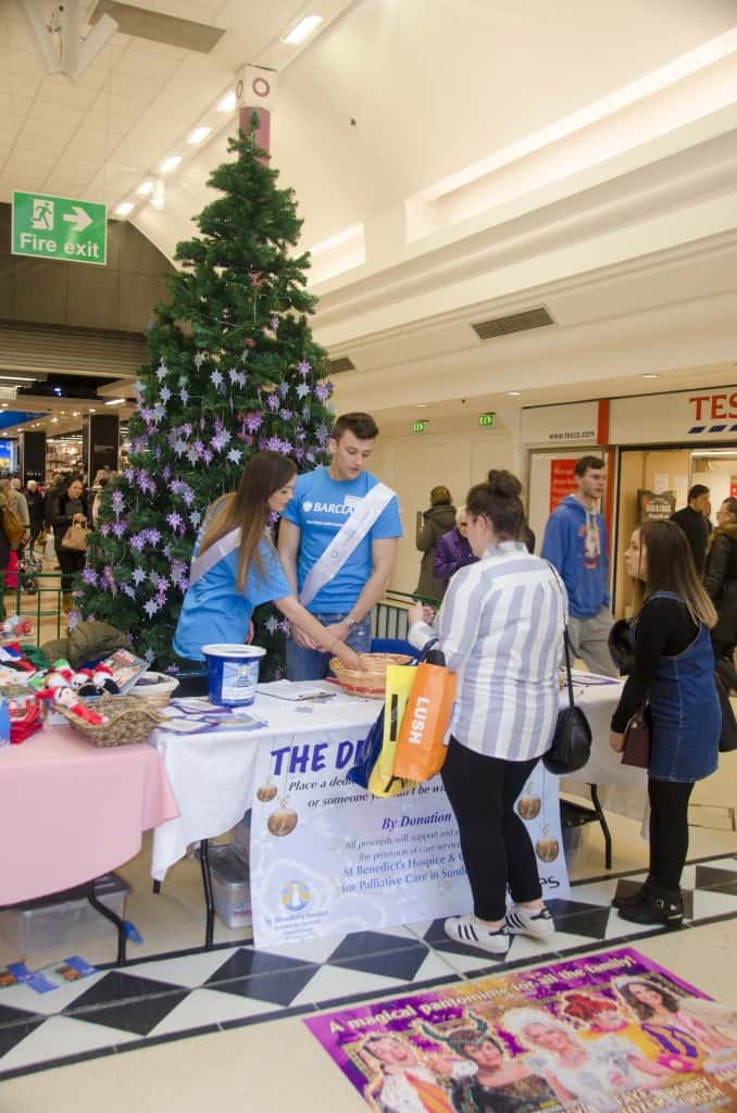 Jack and Sarah-Louise of Barclays volunteering their time to help the Hospice. (Image by Ryan Lim)