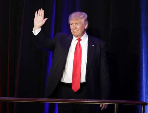 President-elect Donald Trump waves as he arrives at his election night rally, Wednesday, Nov. 9, 2016, in New York. (AP Photo/John Locher)