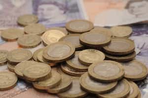 File photo dated 27/01/15 of a selection of one pound coins, two pound coins and bank notes/picture by Joe Giddens PA Wire/PA Images.