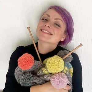 Beccy Owen with her knitting needles and wool.