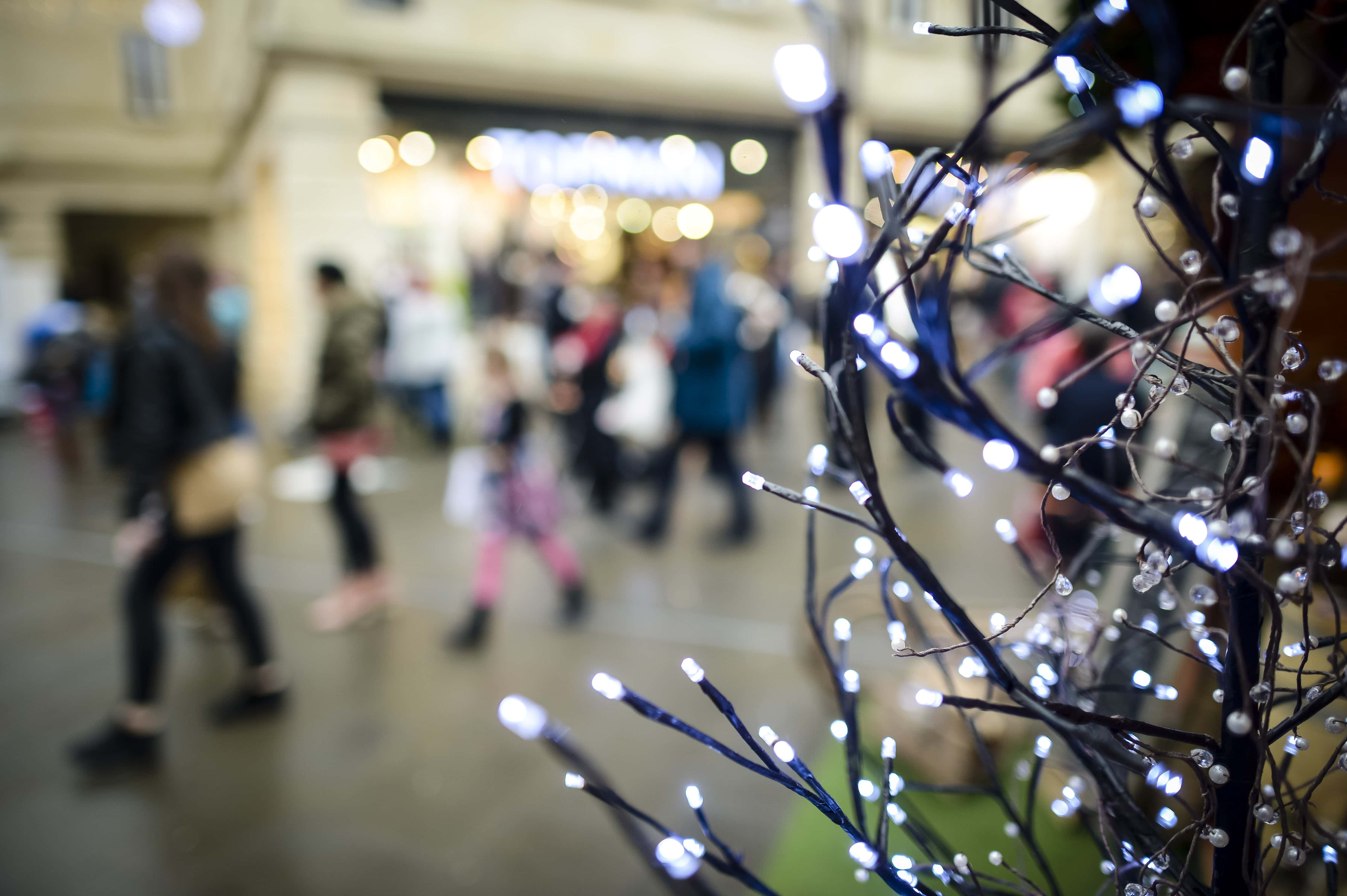 Fairy lights in Bath, as panic-buyers and bargain-hunters are expected to flood stores on the busiest day in the Christmas shopping calendar today, with high street shops slashing prices in an attempt to coax consumers down the aisles.