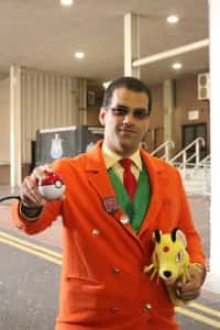 chunkypenguin cosplay as Giovanni, the leader of bad guys Team Rocket at last year's SunnyCon