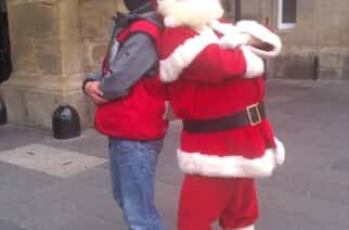 Earl Charlton Big Issue Vendor With Santa